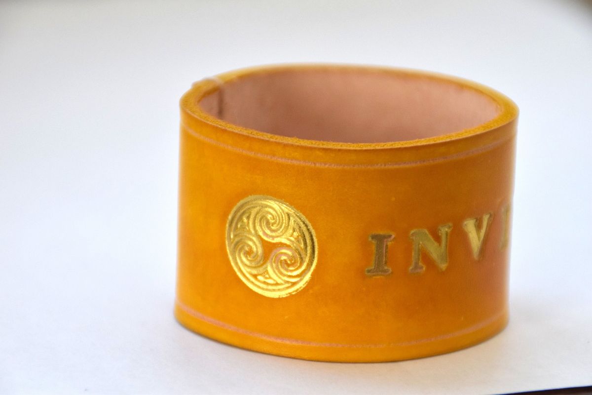 Personalized napkin ring with gold engraving