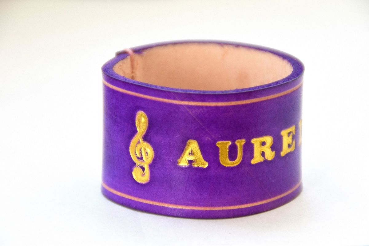 Personalized napkin ring with gold engraving